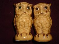 Tall butterscotch colored Owls